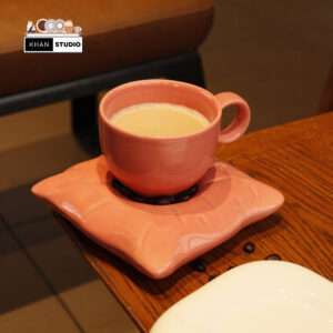 ceramic mug and saucer