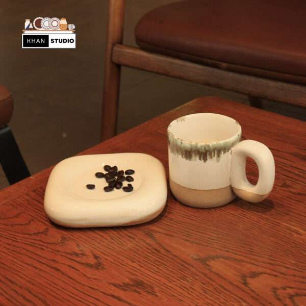 ceramic mug and saucer