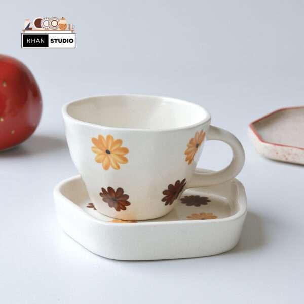 ceramic mug and saucer